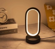 Lampa LED w kształcie litery U – stylowa dekoracja do sypialni i salonu