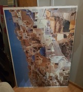 Duży piękny obraz Santorini z puzzli w antyramie