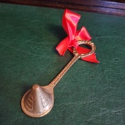 Mosiężne gasidełko do świec 