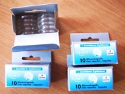 Kapsuły 25 mm typu Leuchtturm z rantem  4 opak.  po 10 sztuk  Stan !!!