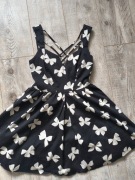 Sukienka rozkloszowana czarna w białe kokardki atmosphere 36 kod996