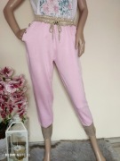 Spodnie dresowe ze złotymi guzikami wiązane elastyczne dresy wiskoza