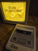 Super Nintendo SNES, pad, zasilacz, kable, 4 gry