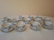 PRL Porcelanowy serwis kawowy WAWEL 12 filiżanek i spodków ze złoceniami