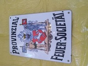 Stara tablica reklamowa towarzystwa.