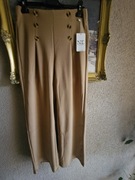 Spodnie damskie szerokie nogawki M/L karmelowe ozdobne guziki