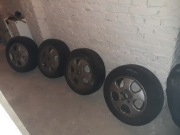 Felgi aluminiowe + opony letnie Opel Astra II G