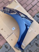 FORD FIESTA MK7 BŁOTNIK LEWY PRZEDNI E9