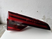 Tylna lampa bagażnika od Audi A4 B9 Avant. Uszkodzona.