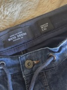 Joggery House 32/32 stan bdb 