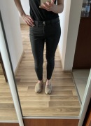 Spodnie woskowane River Island