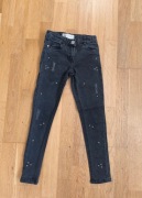 Czarne spodnie jeans dla dziewczynki 128