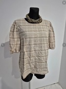 Beżowa bluzka w kratkę z bufkami