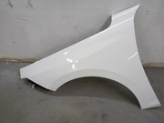 Blotnik przedni lewy opel astra L 6