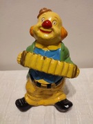 Ceramiczna figurka/ skarbonka klauna grajka. Vintage.