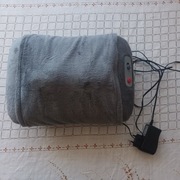 Poduszka masująca i rozgrzewająca.