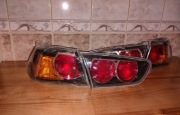 Lampy tył Komplet Nowe Mitsubishi Lancer VIII X Polift