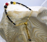 BRANSOLETKA - perła, onyks, koral, hematyt, spinel