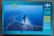 Puzzle Carrefour 1500 - Skok spadochronowy nad Costa Brava
