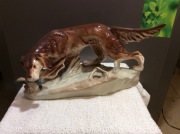 CHART-PIES  Z KACZKĄ W ZĘBACH FIGUKA PORCELANOWA