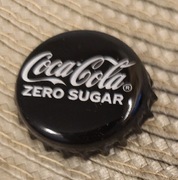 Kapsel Coca Cola butelkowane