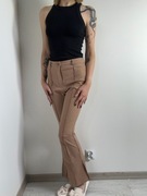 Beżowe spodnie z rozcięciami u dołu rozm. M Shein