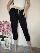 Spodnie dresowe ze złotymi guzikami wiązane elastyczne dresy wiskoza