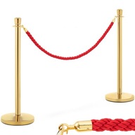 Zlatý hotelový zátaras s červeným lanom