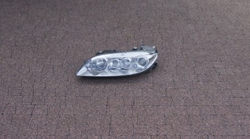 фото thumb №1, Лампа mazda 6 ліва срібляста europa