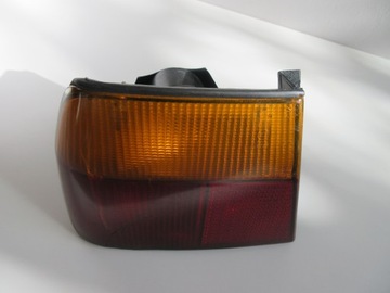 фото thumb №10, Лампа задня ліва + вкладиш lancia dedra оригінал