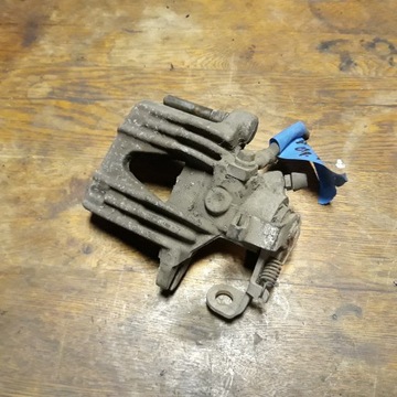 фото thumb №1, Opel astra g супорт гальмівний зад лівий