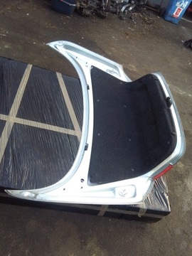 фото thumb №8, Кришка задня лампи зад vw eos срібна lk7w комплектна