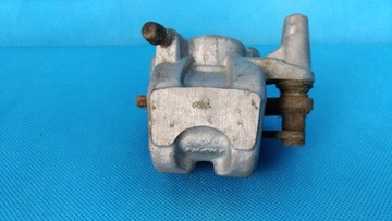 SUZUKI KINGQUAD 500 ZACISK HAMULCOWY PRAWY PRZÓD