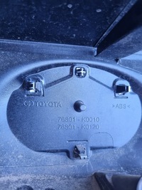 фото thumb №12, Toyota yaris iv оригинальный номер 76801-k0010 накладка крышки багажника