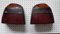 фото thumb №1, Лампи задня vw golf iii 3 hella тоновані kpl. 1h6945111b