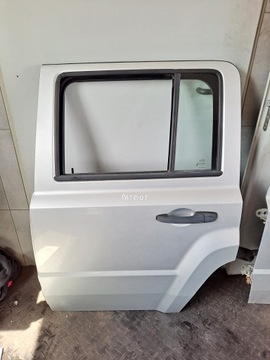 фото thumb №1, Дверь левый зад задние комплектные jeep patriot