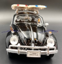 Volkswagen Beetle + доски для серфинга 1:24 Motormax 79591 черный