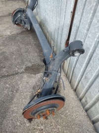 Вісь  задній балка toyota yaris 2 06-11 гальмівні диски Оригінал, фото thumb