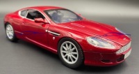 Aston Martin DB9 Coupe 1:24 модель Motormax 73321 красный