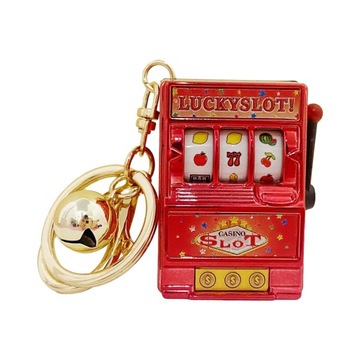 Банк Lucky Slot Machine с вращающимся барабаном. Компактный фруктовый игровой автомат красного цвета.