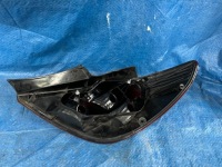 фото thumb №2, Opel corsa d 5d левая задняя лампа