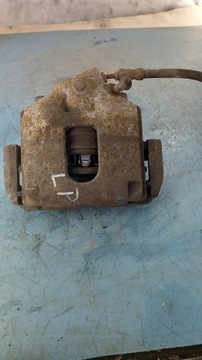 фото thumb №1, Супорт гальмівний перед лівий mazda 2 1.4b 06r