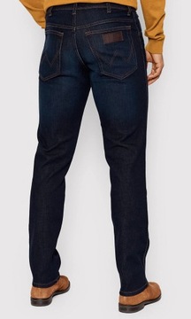 Wrangler TEXAS SLIM Lucky Star EPIC SOFT granatowe spodnie jeansowe W42 L30