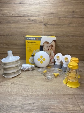 Электрический молокоотсос Medela Swing Maxi 300 мл, в очень хорошем состоянии.