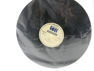 ВИНИЛОВЫЕ КРЫШКИ LP + ВНУТРЕННЯЯ ФУТБОЛКА 50 ШТ.