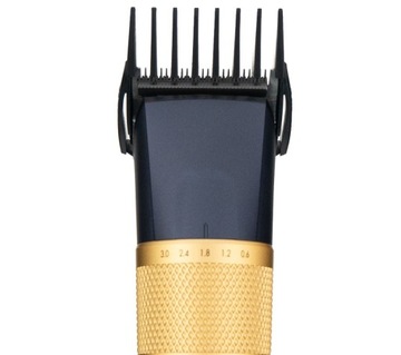 Машинка для стрижки волос BABYLISS E986E триммер 8 насадок 45 длин 0,6-28 Титан
