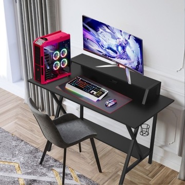 Стол для игрового компьютера с подставкой для монитора, портами USB и ручкой.