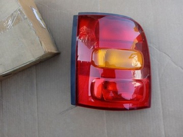 фото thumb №1, Nissan micra k11 лампа ліва задня зад оригінал.