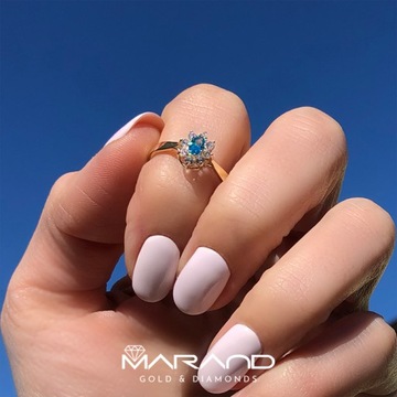 Złoty pierścionek MARKIZA TOPAZ SKY 333 8K r 15