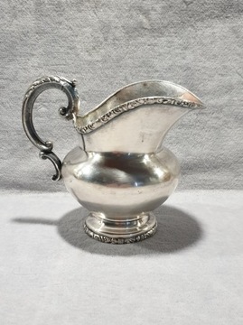Молочник, покрытый норблином, 19 век.